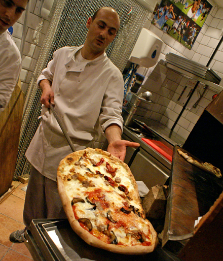 Pizza Metro pizzaiolo Pizza Metro pizzaiolo pulls out a beauty for wood-fired brick pizza oven