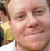 Neil Holmes, Producer Blitz 1UP