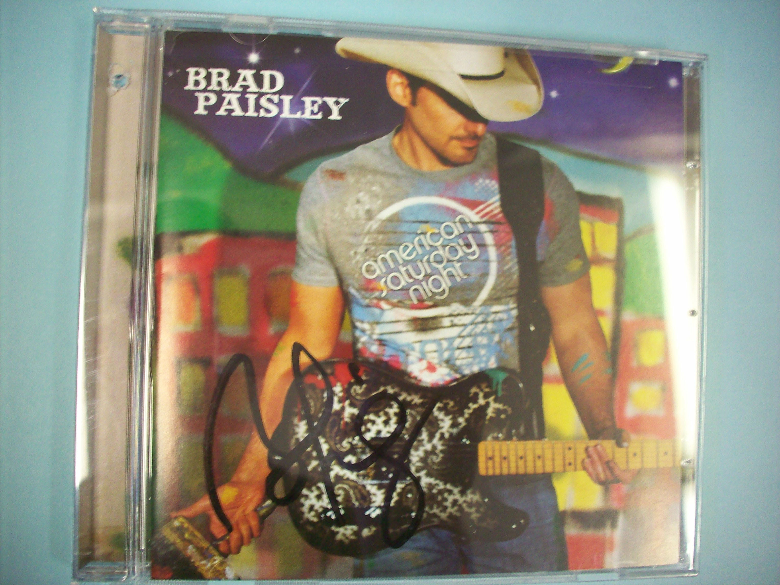 Brad Paisley signed his newest CD in his support of the softball tournament