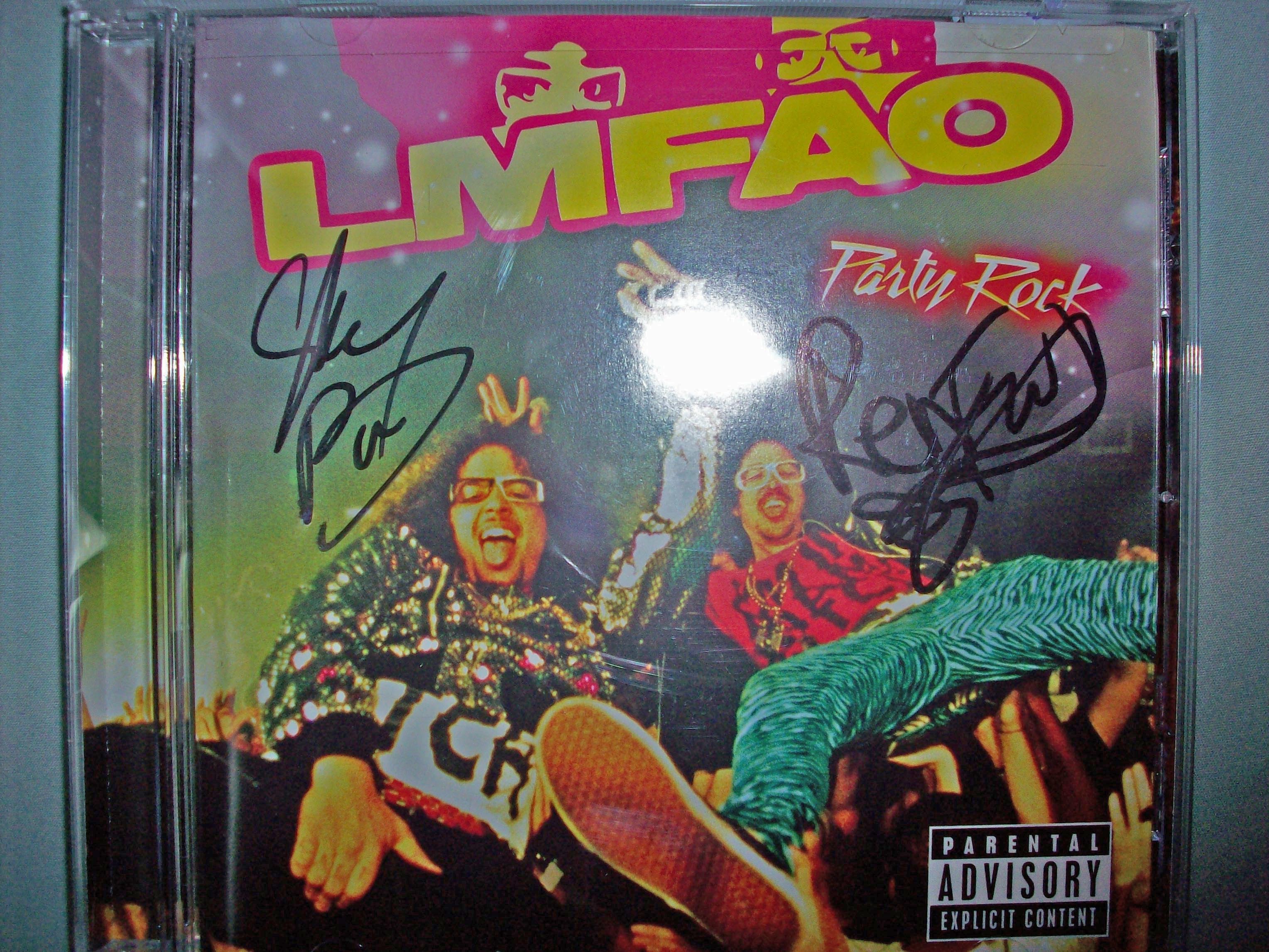 Grammy Nominated LMFAO's album signed by the duo, Redfoo and Sky Blu