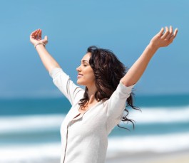 woman with her arms up