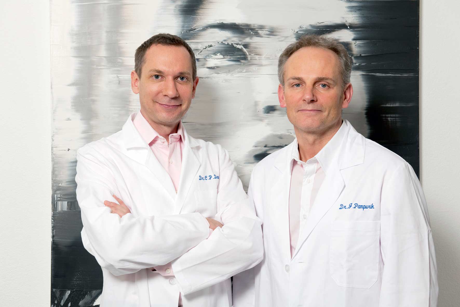 Dr. Clarence P. Davis / Dr. Jan Pampurik